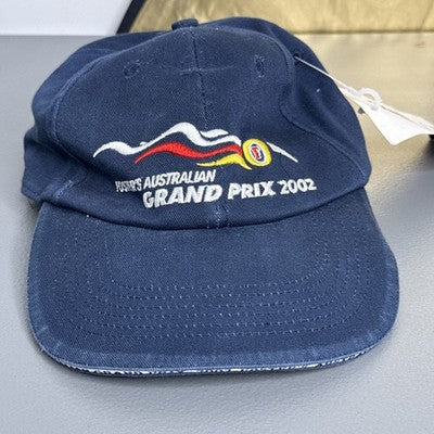 Vintage 2002 black Fosters Australian Grand Prix baseball cap with original tags, featuring a classic design by Goodsports International.