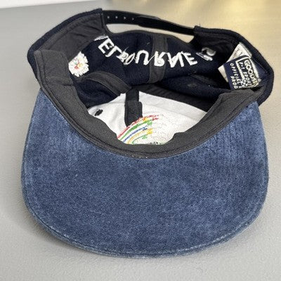 Black baseball cap featuring "Melbourne 1996 Australian Grand Prix" bold spellout, by Goodsports International.