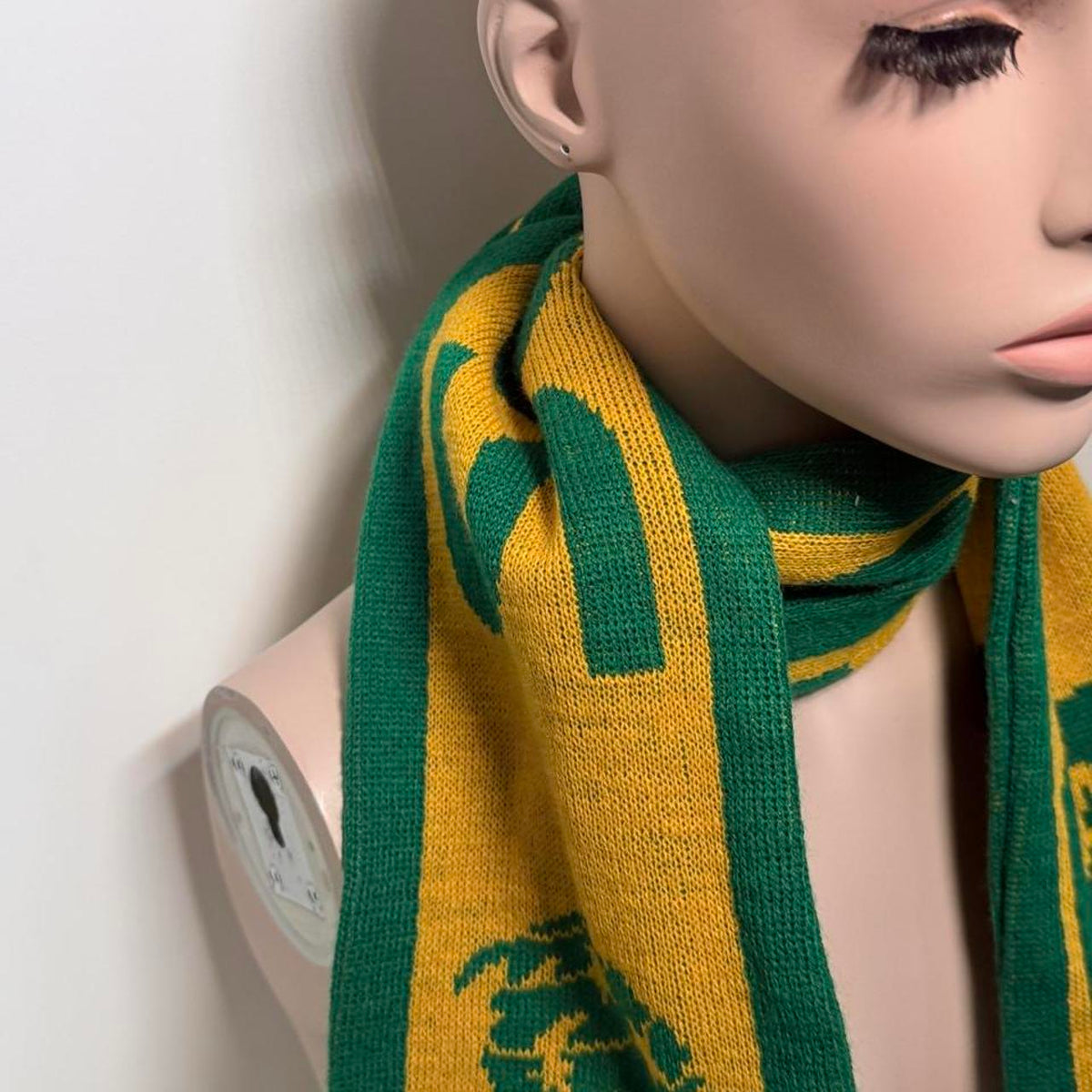 Australia soccer scarf featuring green and yellow stripes, a green tree logo, and the word 'AUSTRALIA'.