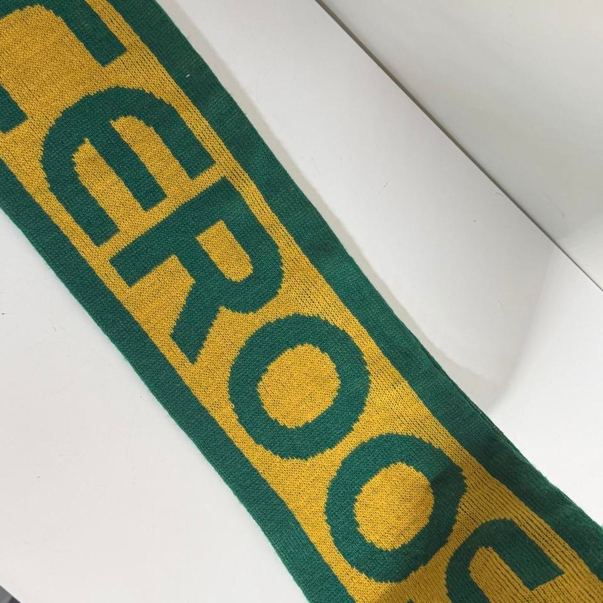 Australia soccer scarf featuring green and yellow stripes, a green tree logo, and the word 'AUSTRALIA'.