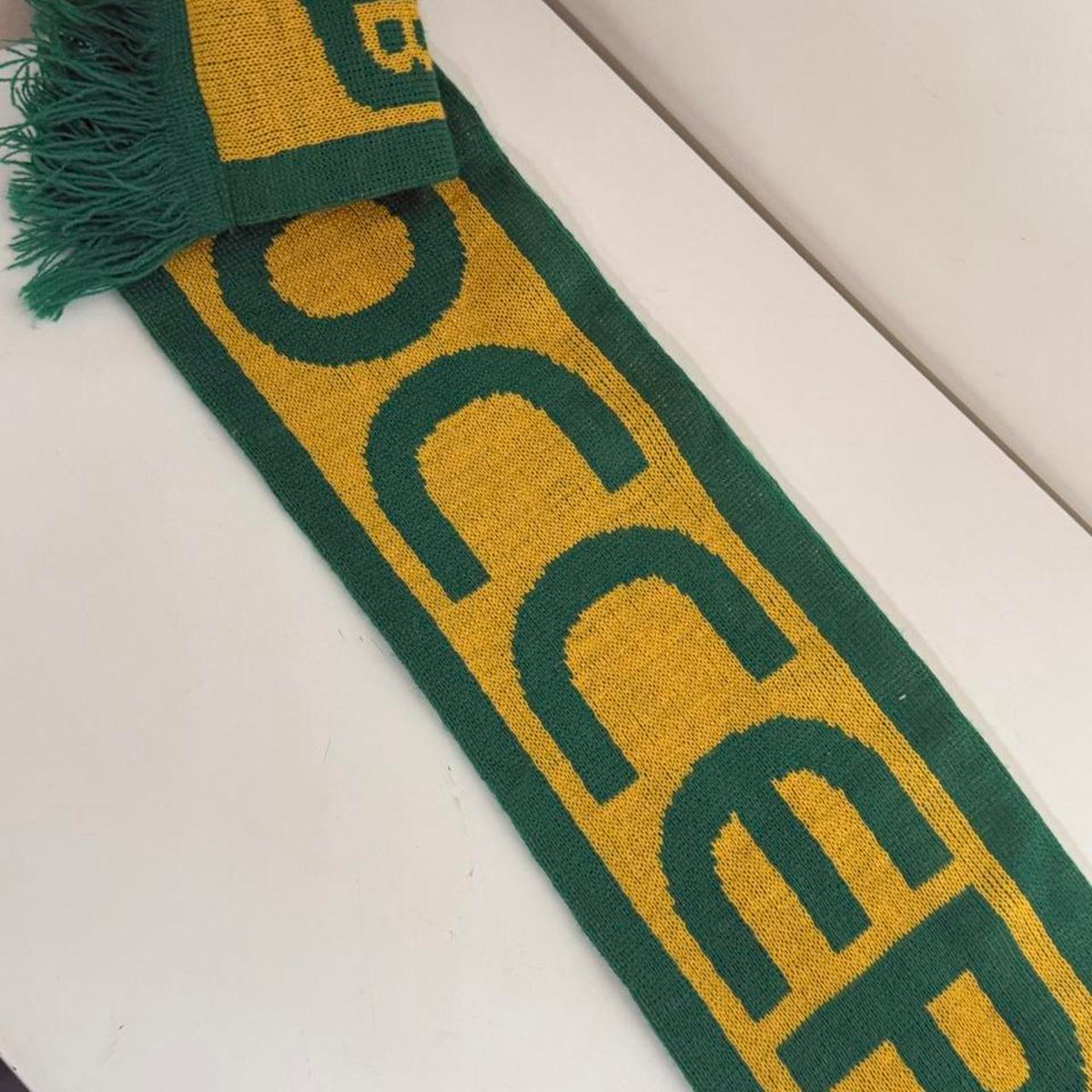 Australia soccer scarf featuring green and yellow stripes, a green tree logo, and the word 'AUSTRALIA'.