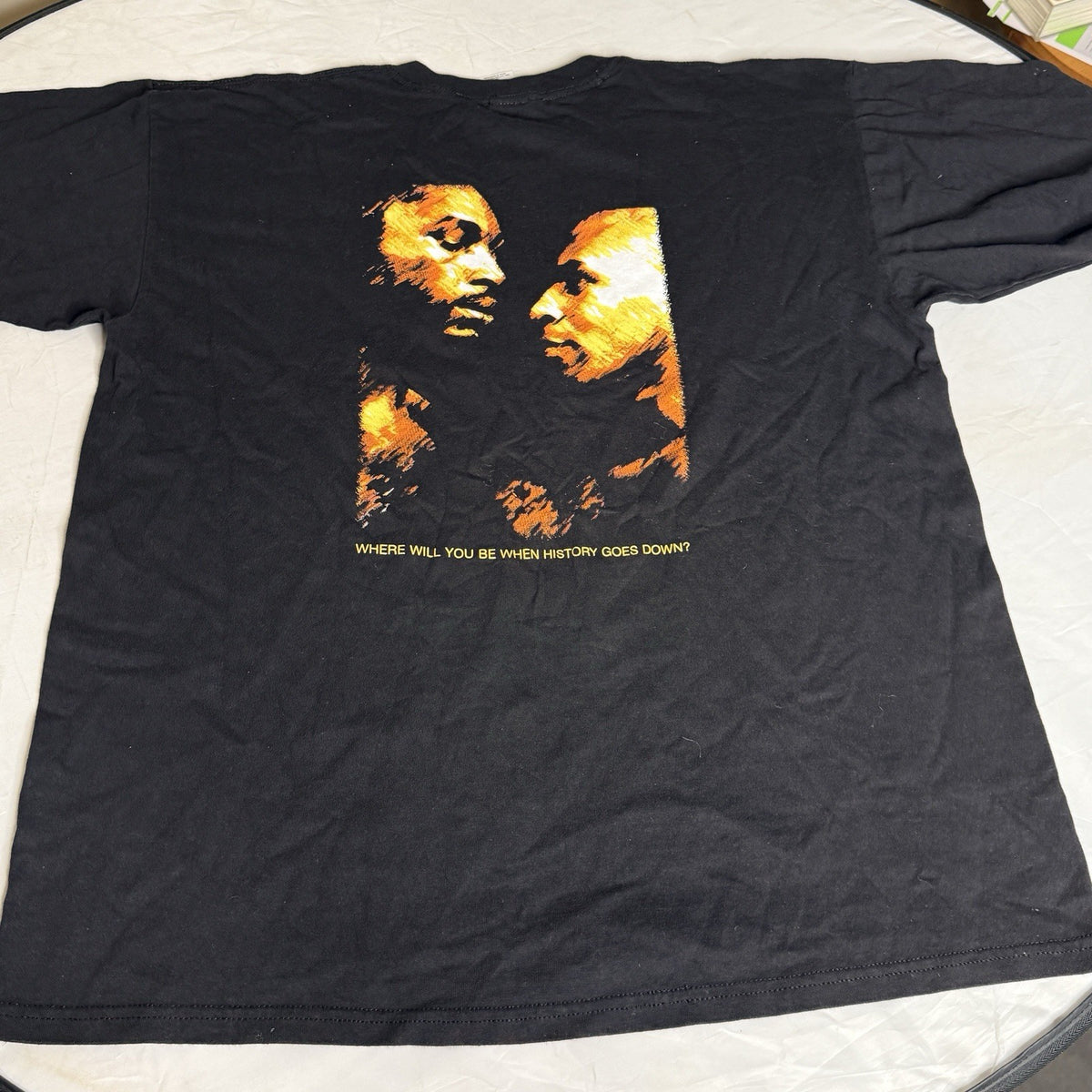 Black, white, and yellow vintage T-shirt featuring Mike Tyson vs. Lennox Lewis, size XL, from 2002.