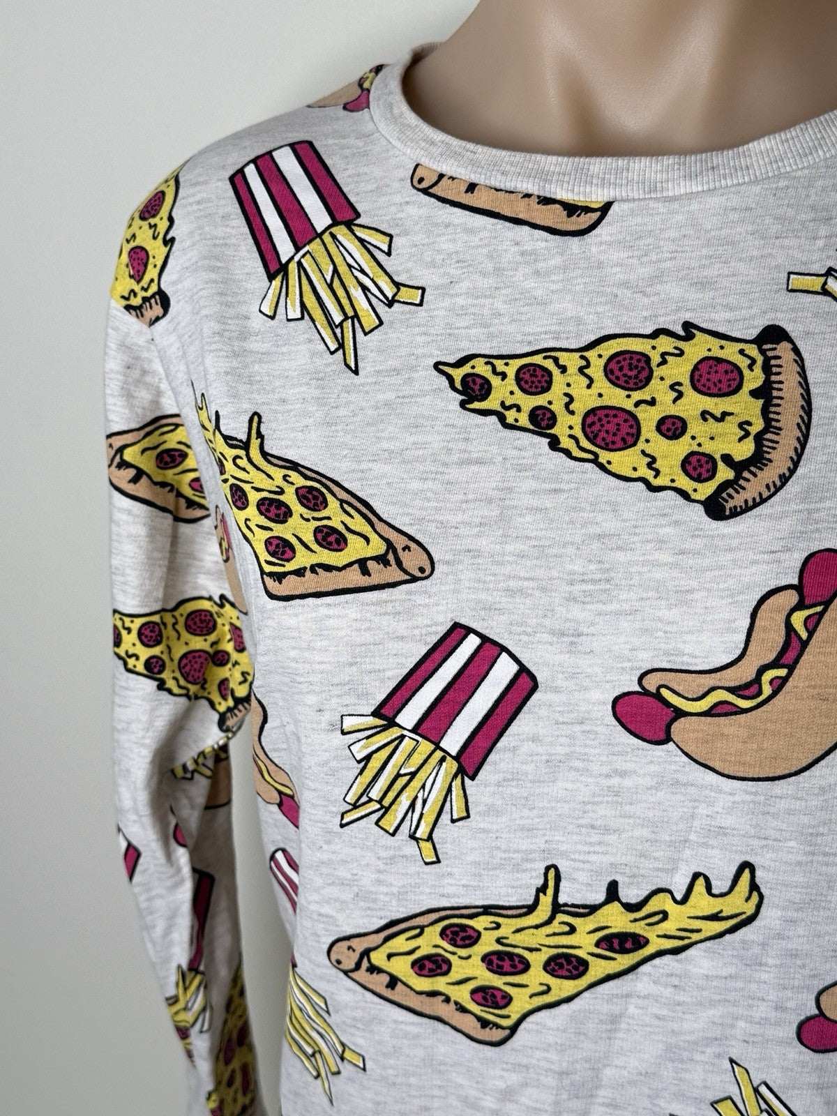 H&M Divided women's XS grey sweatshirt featuring a colorful food print of pizza, hot dogs, and fries.