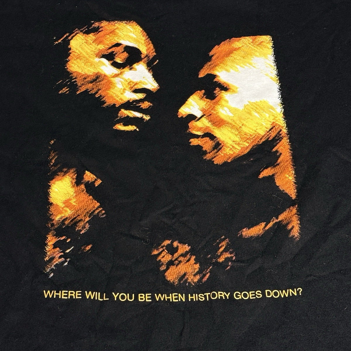Black, white, and yellow vintage T-shirt featuring Mike Tyson vs. Lennox Lewis, size XL, from 2002.