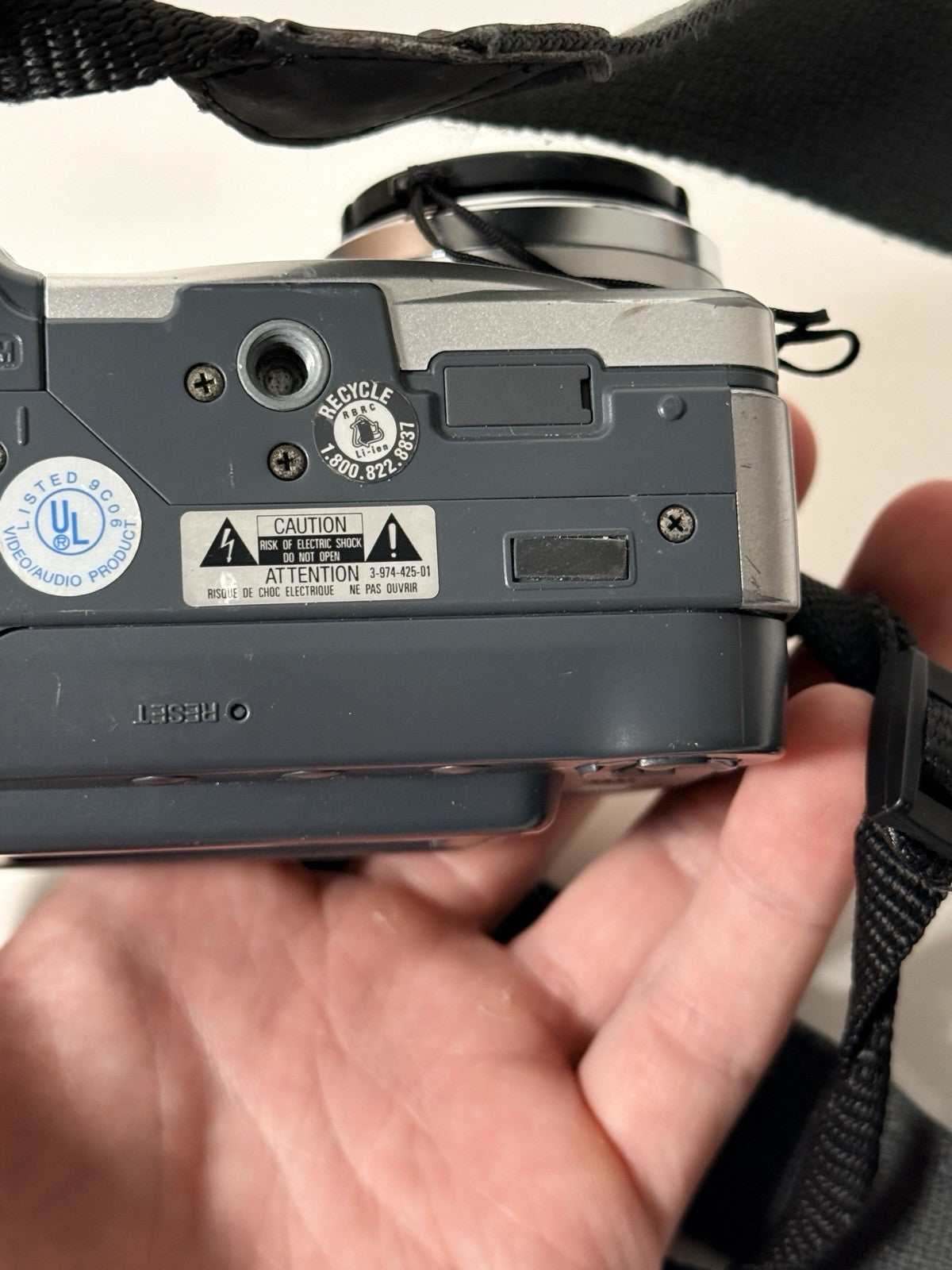 Vintage Sony Mavica MVC-CD350 digital camera in grey and silver, 3.2MP, includes strap and lens cap.
