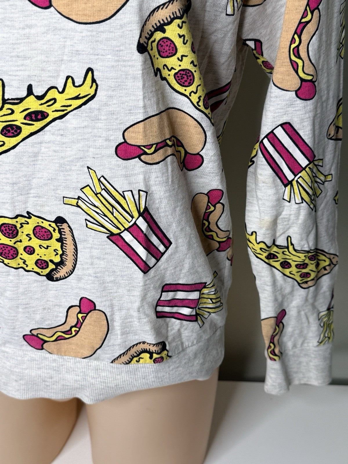 H&M Divided women's XS grey sweatshirt featuring a colorful food print of pizza, hot dogs, and fries.