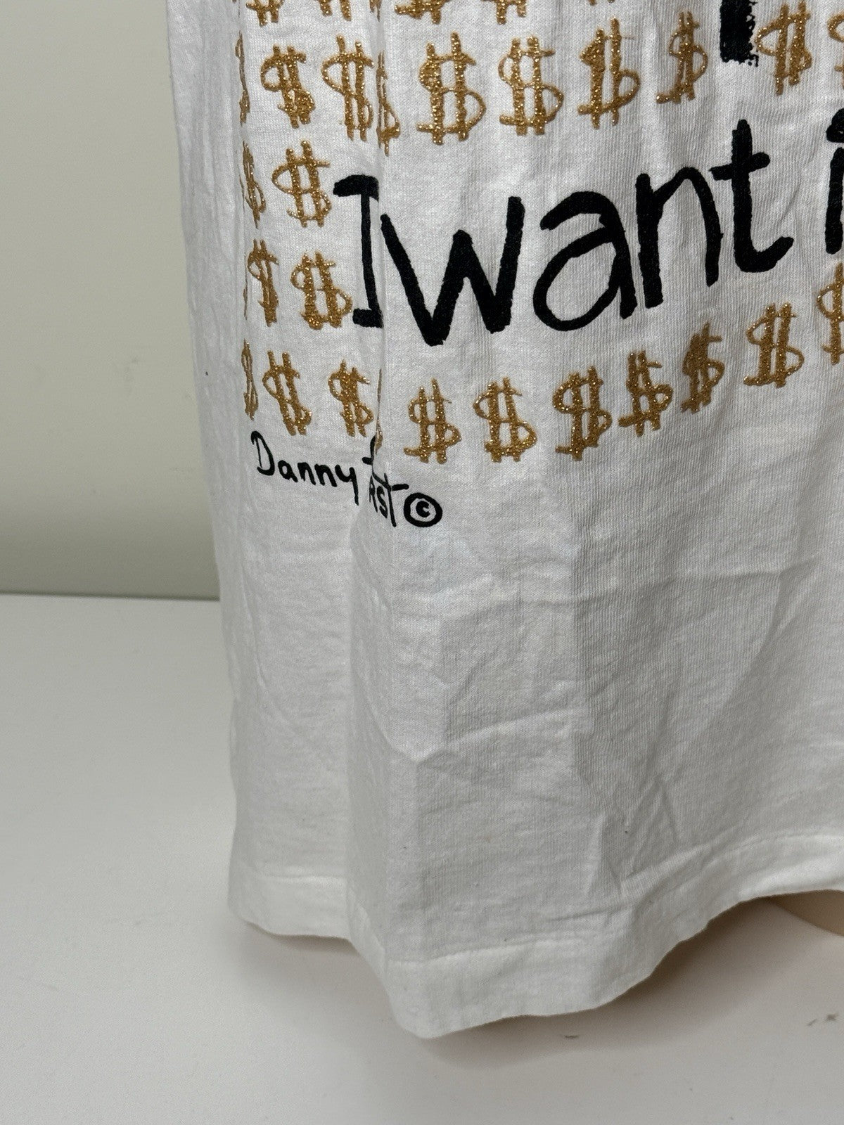 White vintage New York "I Want It All!" graphic T-shirt by Danny First, size XL, featuring a cartoon design and gold dollar signs.