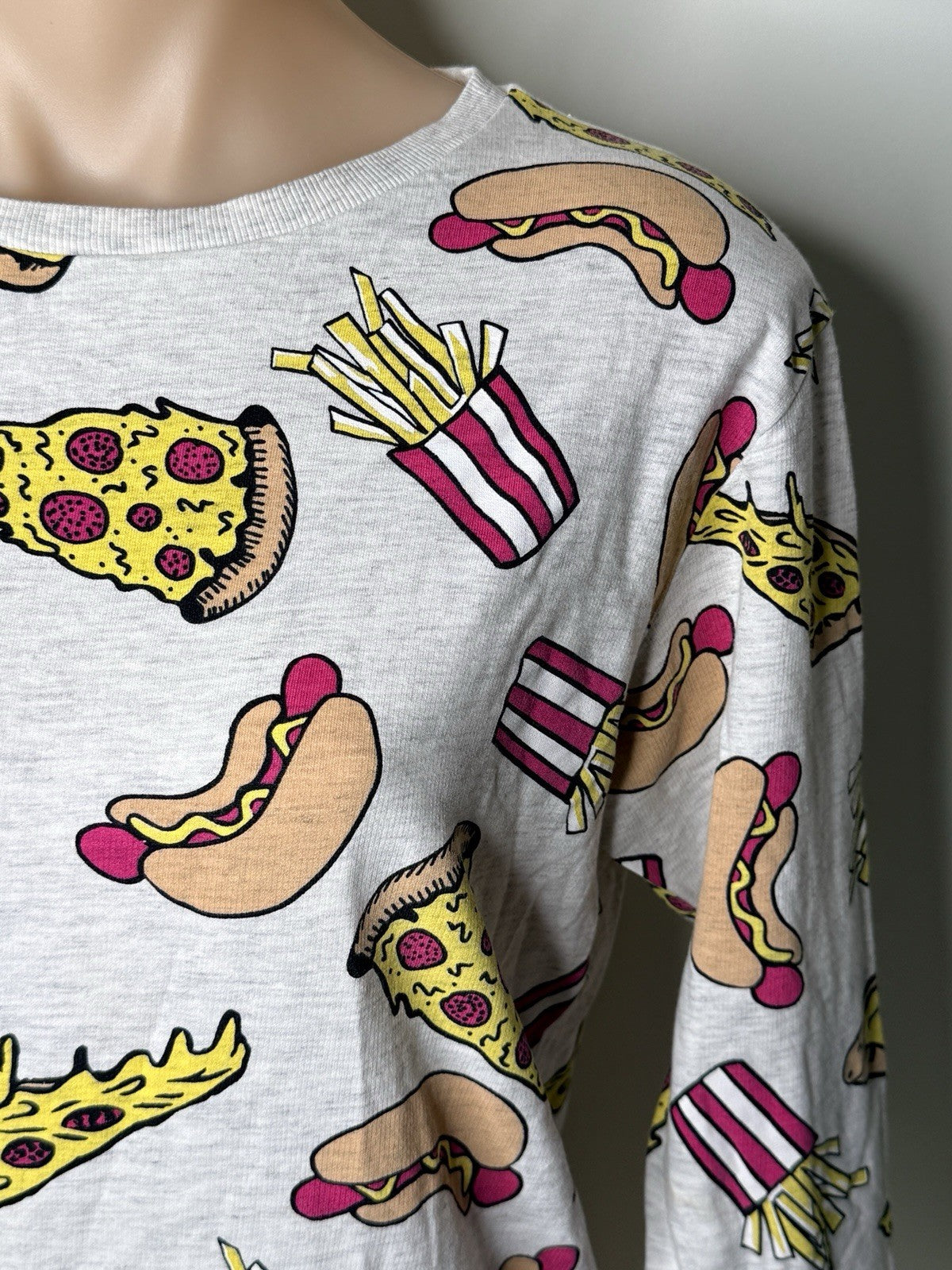H&M Divided women's XS grey sweatshirt featuring a colorful food print of pizza, hot dogs, and fries.