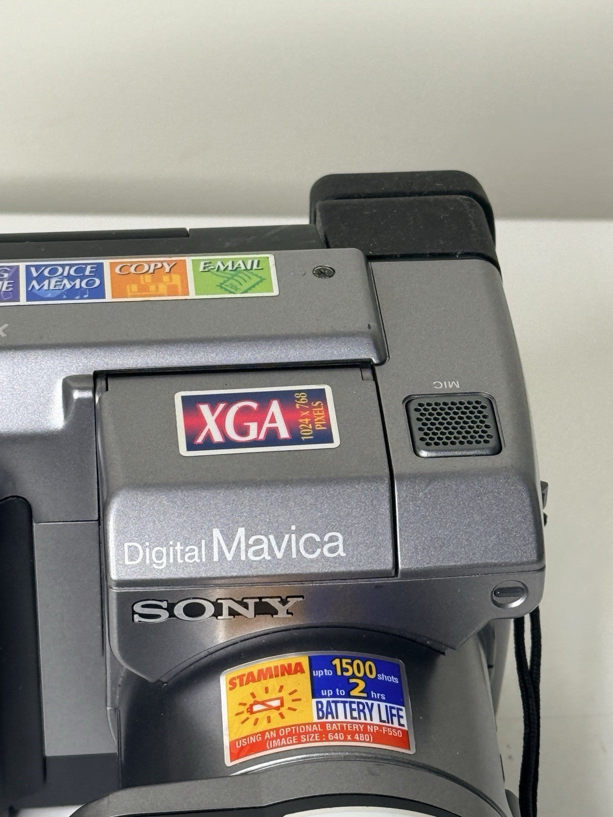 Vintage Sony Digital Mavica MVC-FD91 camera in black and grey, featuring 3.5-inch floppy disk storage.