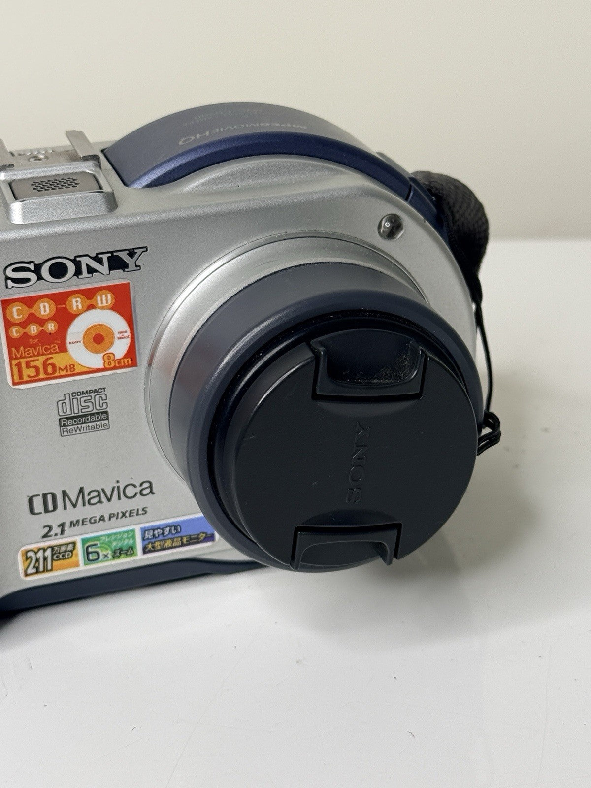 Vintage Sony Mavica MVC-CD200 digital camera in blue and silver, featuring 2.1MP and 6x zoom.