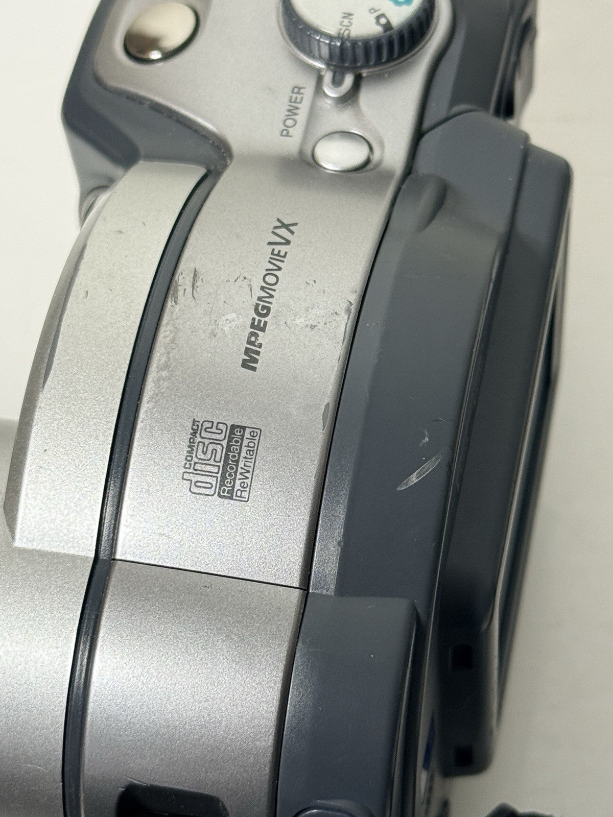 Vintage Sony Mavica MVC-CD350 digital camera in grey and silver, 3.2MP, includes strap and lens cap.