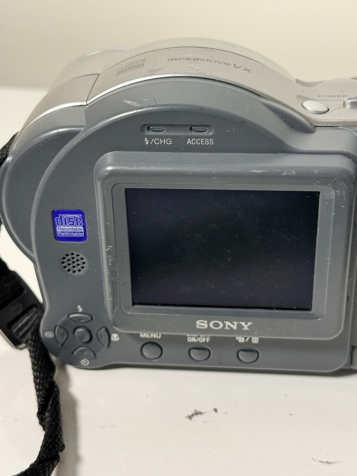 Vintage Sony Mavica MVC-CD350 digital camera in grey and silver, 3.2MP, includes strap and lens cap.