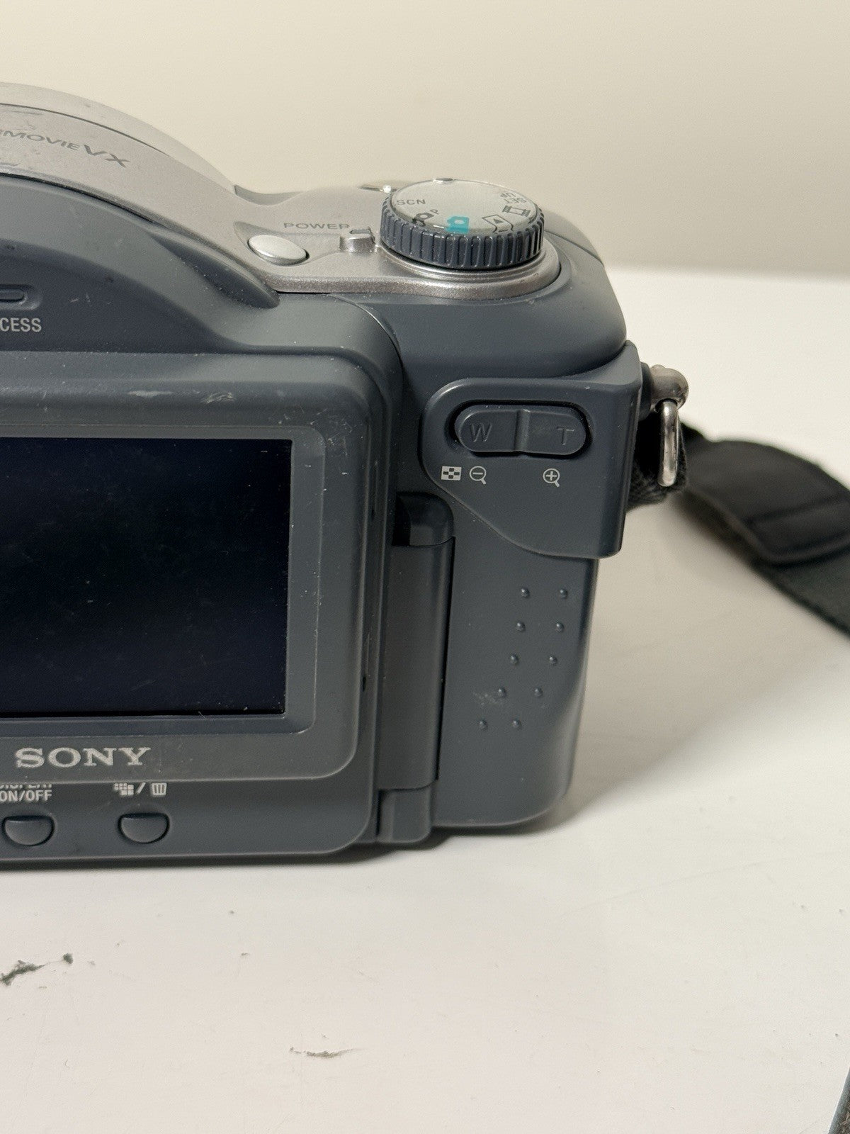 Vintage Sony Mavica MVC-CD350 digital camera in grey and silver, 3.2MP, includes strap and lens cap.