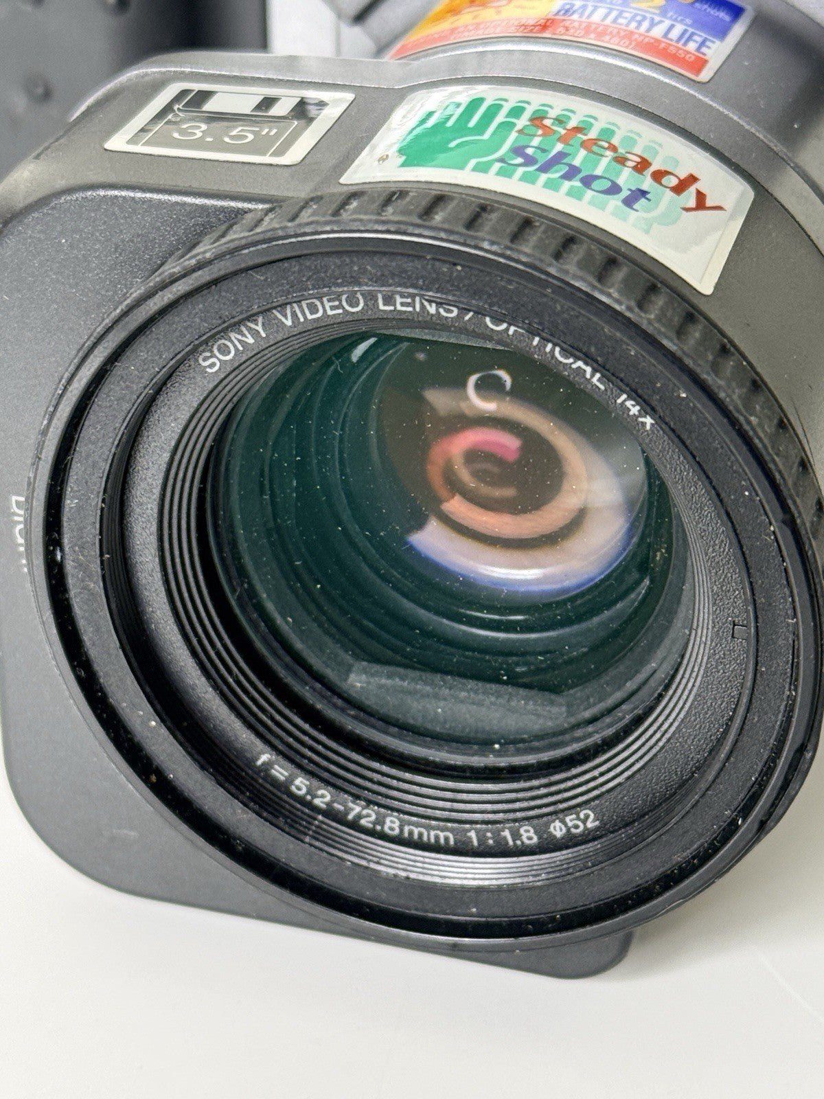 Vintage Sony Digital Mavica MVC-FD91 camera in black and grey, featuring 3.5-inch floppy disk storage.